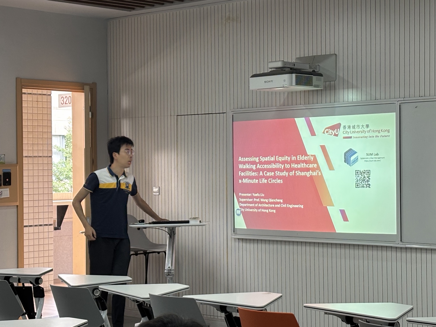 Yuefu Liu presenting on elderly walking accessibility